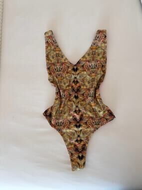 Reversible one piece high cut bikini by Kai Lani